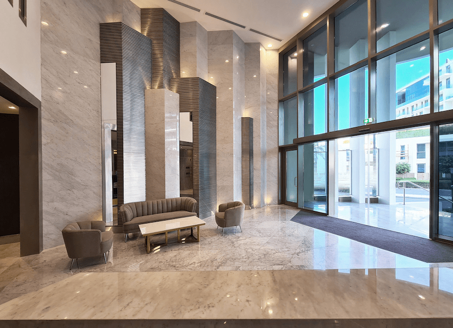 Panoramic view of Ajwan Towers with uninterrupted sea horizon and vibrant cultural district surroundings.